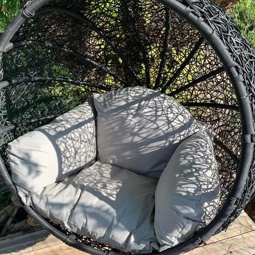 Hanging egg chair with custom grey cushion set